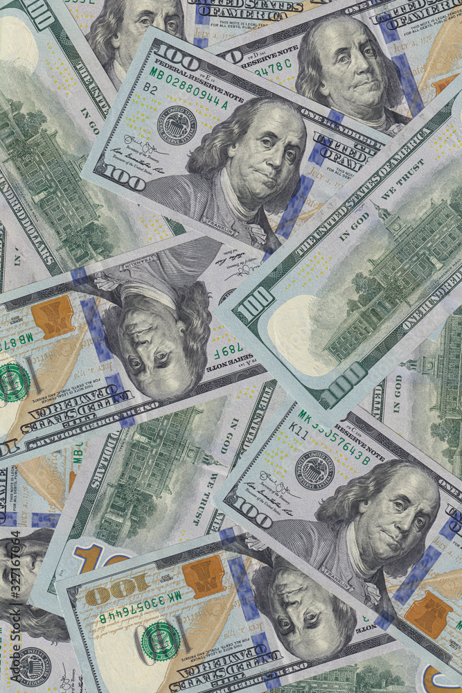 Hundred dollar bills or banknotes background. American money full background close-up and flat lay. High detail usd background and texture. Hundred dollar bills or banknotes background. American money full background close-up and flat lay. High detail usd background and texture.