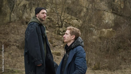 Wallpaper Mural Two Friends In Nature. Stylish Young Guys. One Standing On Stone Above The Other. Torontodigital.ca