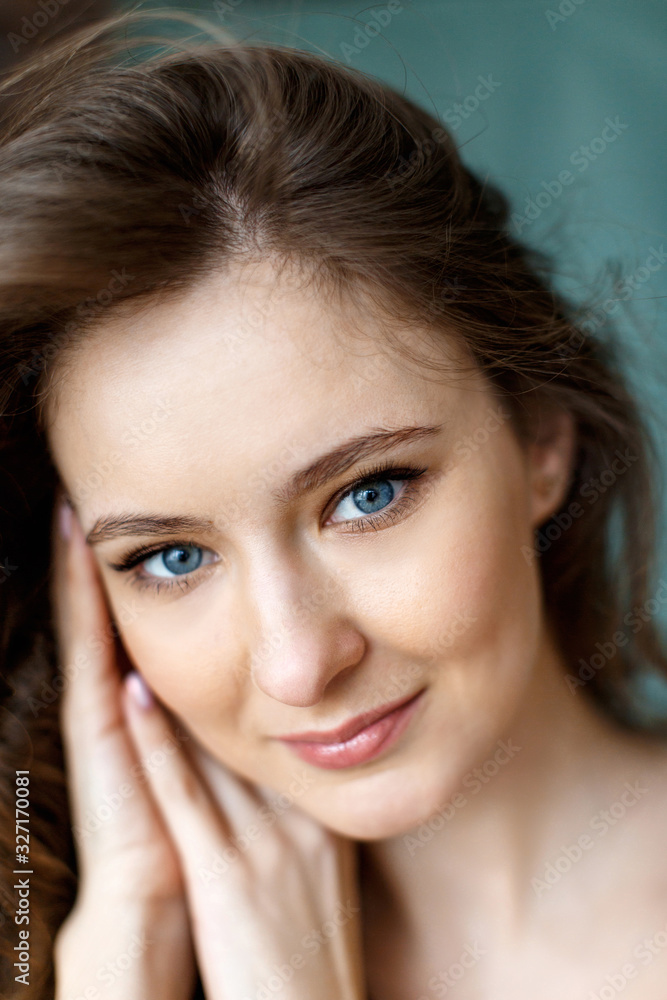 Portrait of a beautiful brunette woman. Close-up