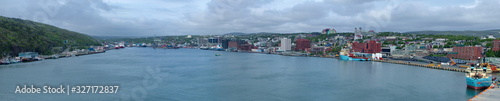 Ships along the wharf in St. John`s harbour, Newfoundland, Canada.