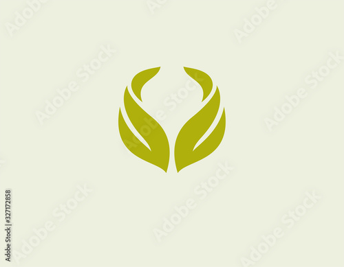 Abstract green logo icon two leaf plants spun inside for your company