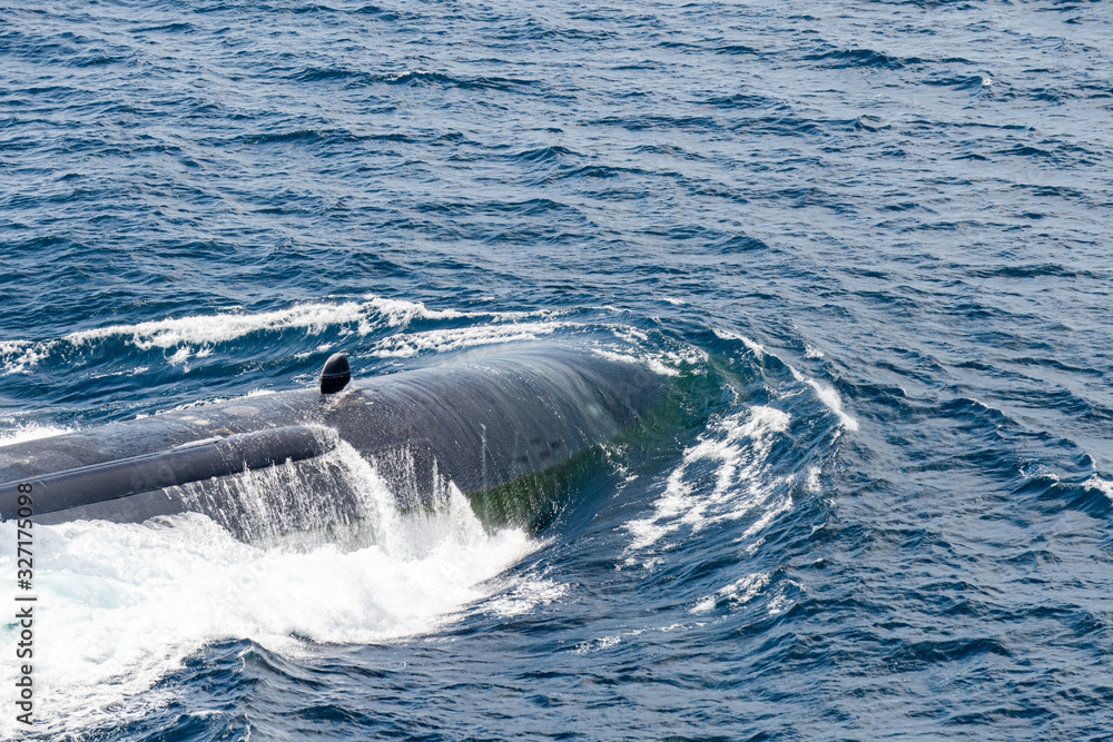Fototapeta premium Bow of the fast attack nuclear submarine of U.S.Navy above the sea surface