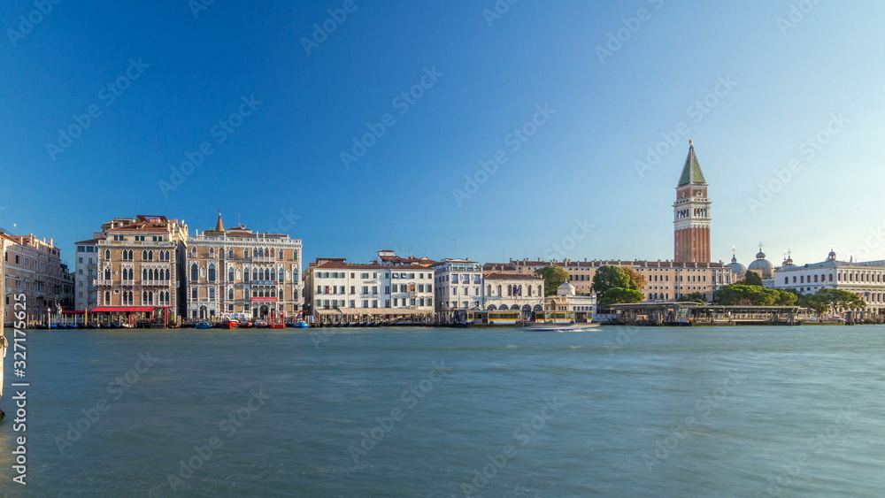 Obraz premium View of the Campanile di San Marco and Palazzo Giustinian, from San Giorgio Maggiore timelapse, Venice, Italy.