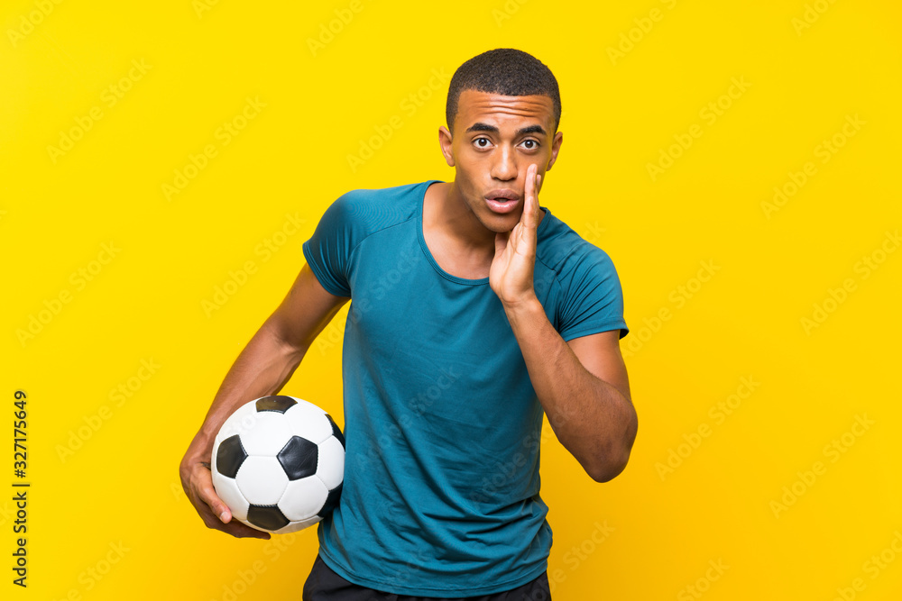 African American football player man whispering something African American football player man whispering something