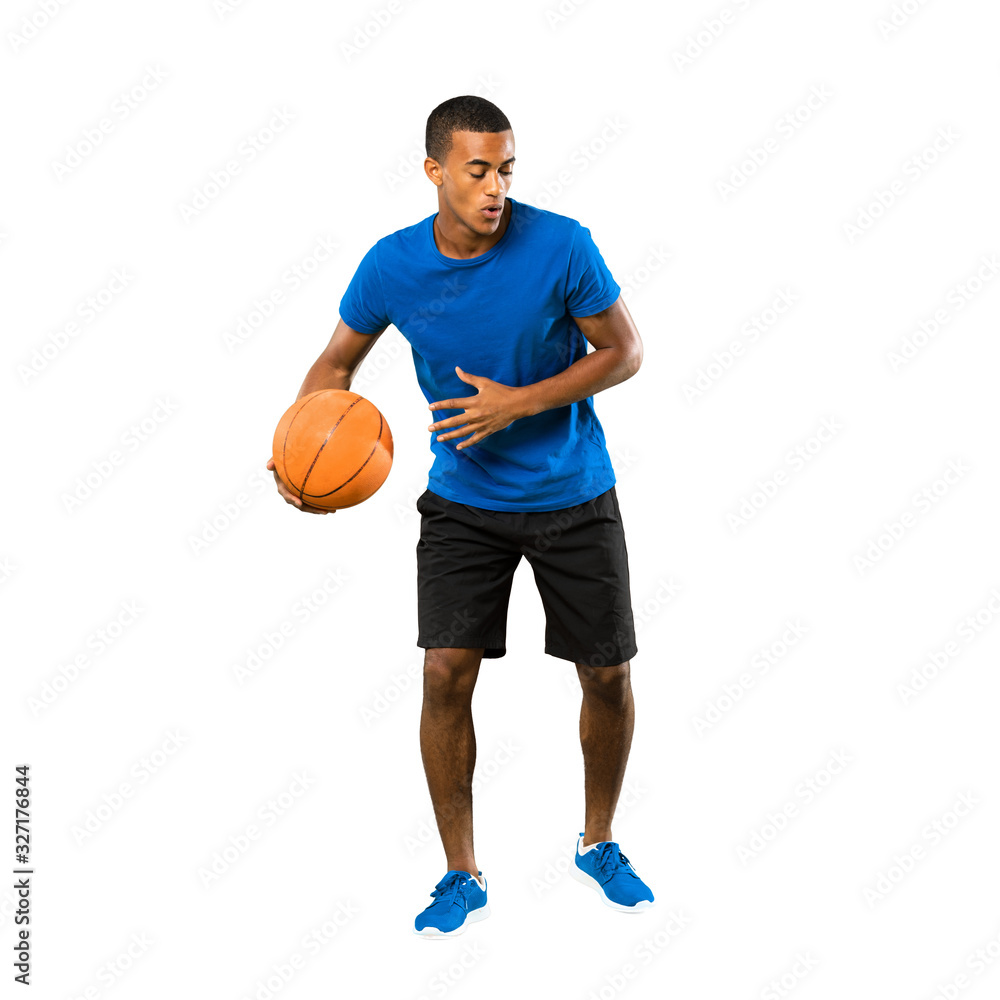 Full-length shot of Afro American basketball player man over isolated white background Full-length shot of Afro American basketball player man over isolated white background