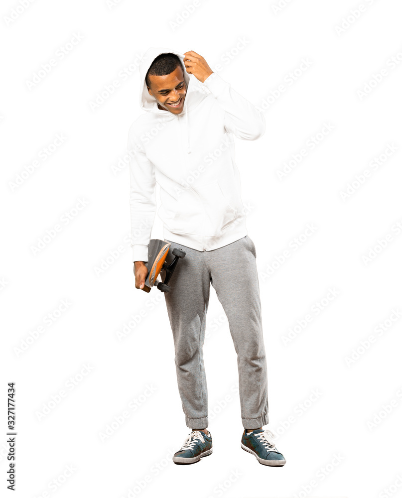 Full-length shot of Afro American skater man over isolated white background