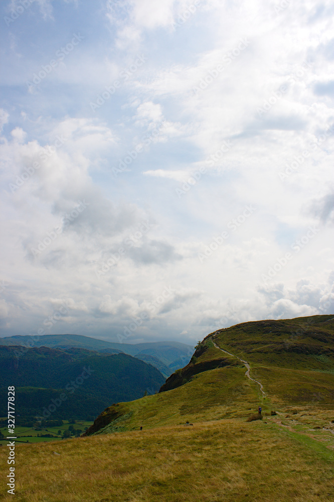 Fototapeta premium landscape with mountains and clouds path