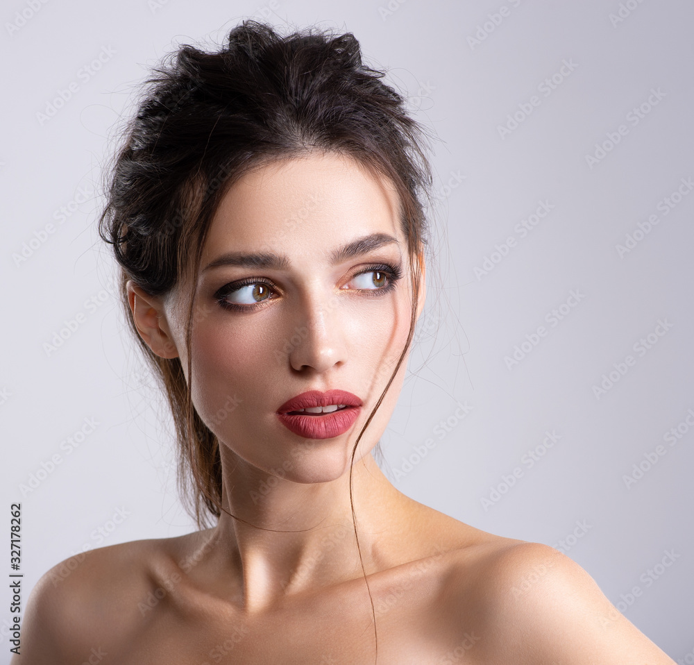 Woman with beauty brown hair. Portrait of brunette woman with beautiful long hairstyle. Fashion model posing at studio. Beautiful young woman with long brown hair. Pretty model poses at studio. Woman with beauty brown hair. Portrait of brunette woman with beautiful long hairstyle. Fashion model posing at studio. Beautiful young woman with long brown hair. Pretty model poses at studio.
