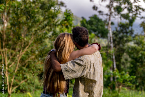 travel couple hugging © Ellie