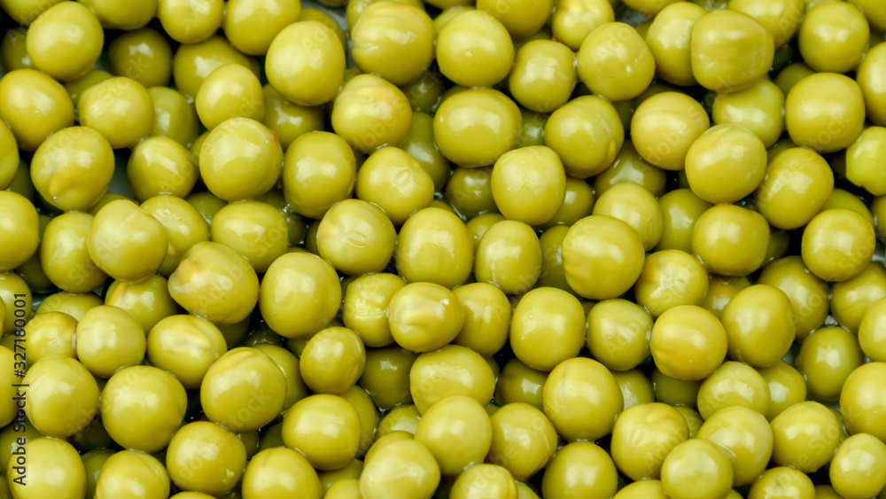 green tomatoes reflect bright electric light lying on large pile before salad preparation green tomatoes reflect bright electric light lying on large pile before salad preparation