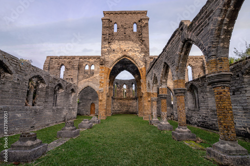 Fotografering Dramatic archways and weathered grey stone ruins