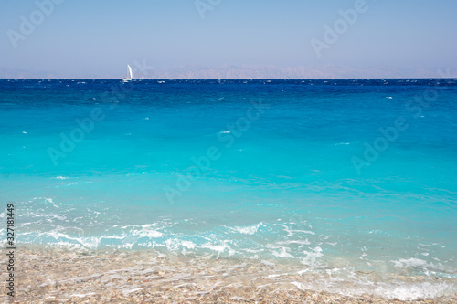 Fototapeta Naklejka Na Ścianę i Meble -  Turquoise water of mediterranean sea on Elli beach on Rhodes island in Greece