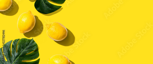 Fresh yellow lemons overhead view - flat lay photo