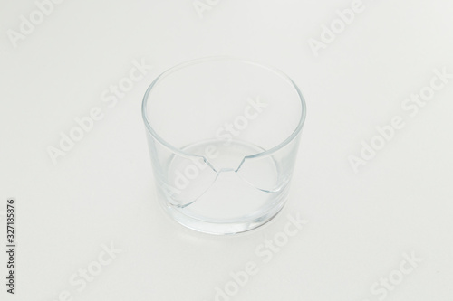 Photography broken white glass and hand on the white background