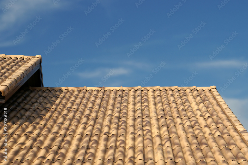 Brown Roof Tiling with Blue Sky Background