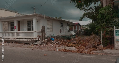 Earthquake damage on a street in Guanica, Puerto Rico. photo