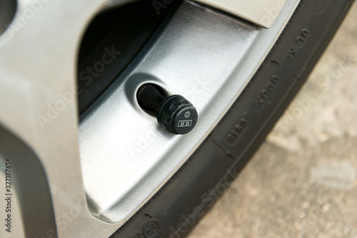 car tire tpms sensor on the car suv wheel.