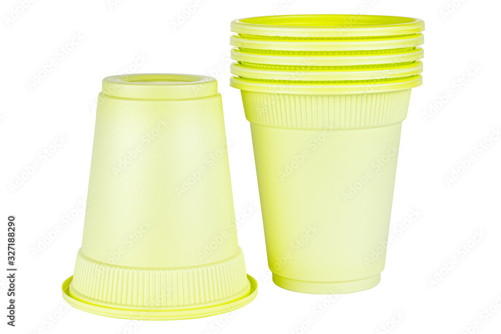 Upside down one and standing five in set unused green disposable cups made of biodegradable materials isolated on white background Upside down one and standing five in set unused green disposable cups made of biodegradable materials isolated on white background