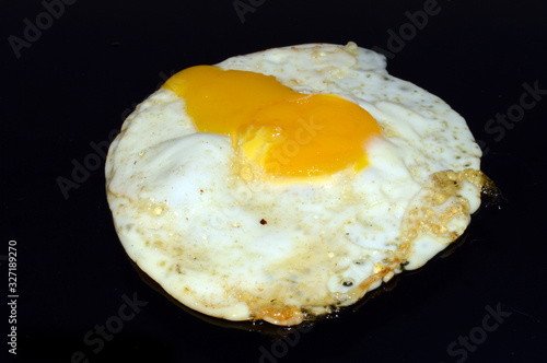 egg isolated on black background