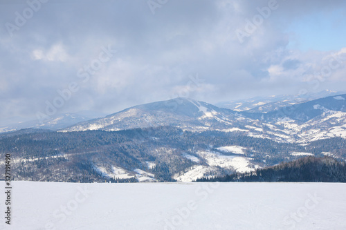 Picturesque view of snowy hills at mountain resort © New Africa
