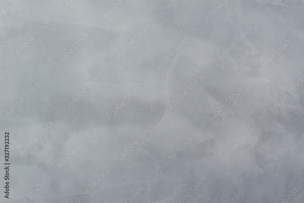 Abstract background grey stone painted cracked wall texture.