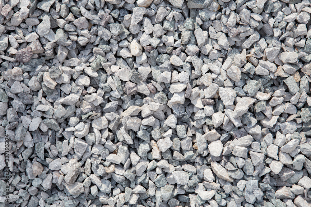 Crushed stone texture background. Crushed stone construction materials. Crushed stone texture background. Crushed stone construction materials.