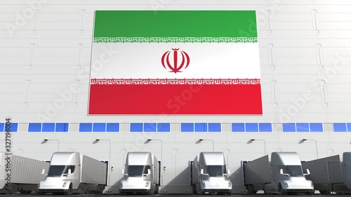 Semi-trailer trucks at warehouse loading dock with flag of IRAN. Iranian logistics related conceptual 3D animation photo