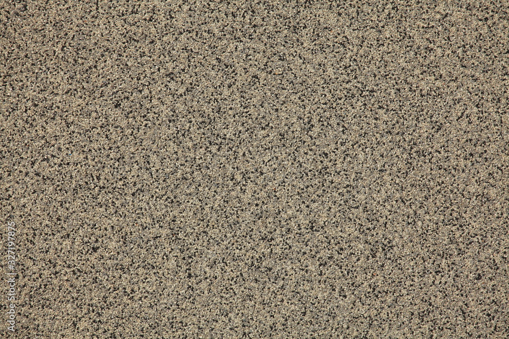 Mosaic and granulated textured coating, texture, background. Structural plaster, rough, uneven surface in brown color. Modern exterior cladding of multi-story buildings Mosaic and granulated textured coating, texture, background. Structural plaster, rough, uneven surface in brown color. Modern exterior cladding of multi-story buildings
