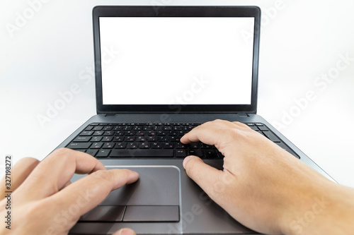 Closeup pov view of hands typing on laptop