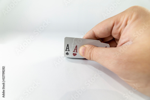 Closeup of checking playing cards isolated on white