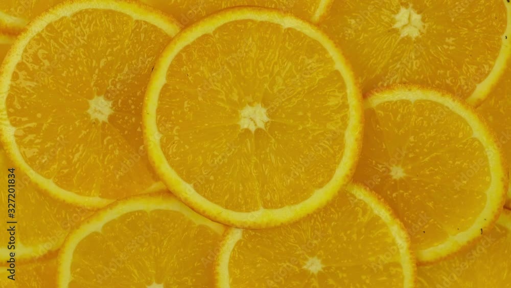 Sliced orange parts rotate on a napkin Sliced orange parts rotate on a napkin