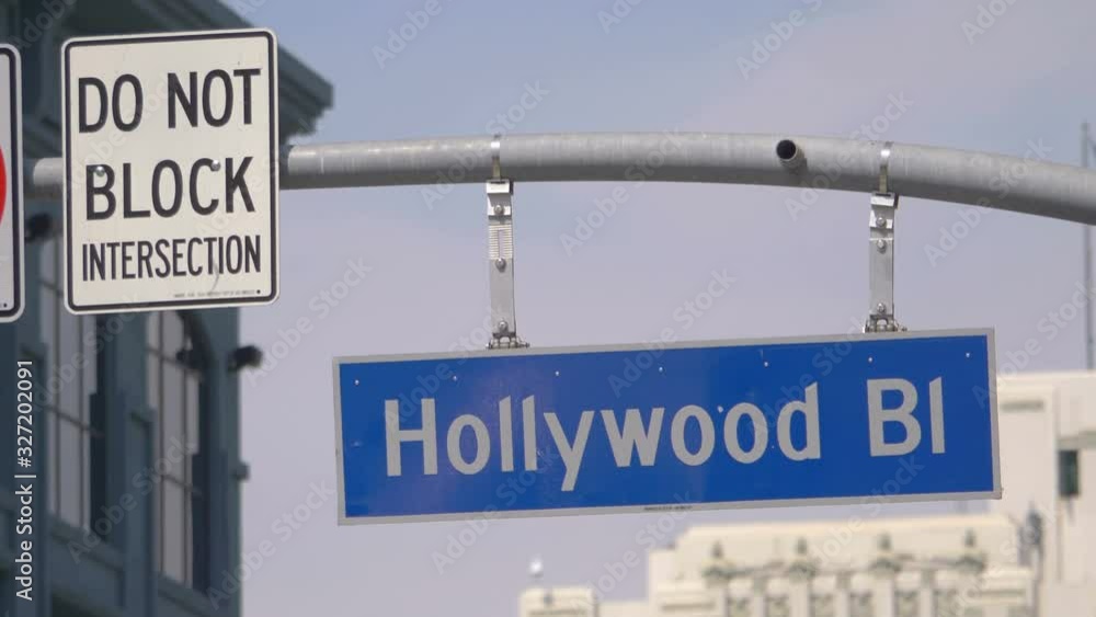 Hollywood boulevard street sign and traffic lights in 4k in slow motion 60fps Hollywood boulevard street sign and traffic lights in 4k in slow motion 60fps