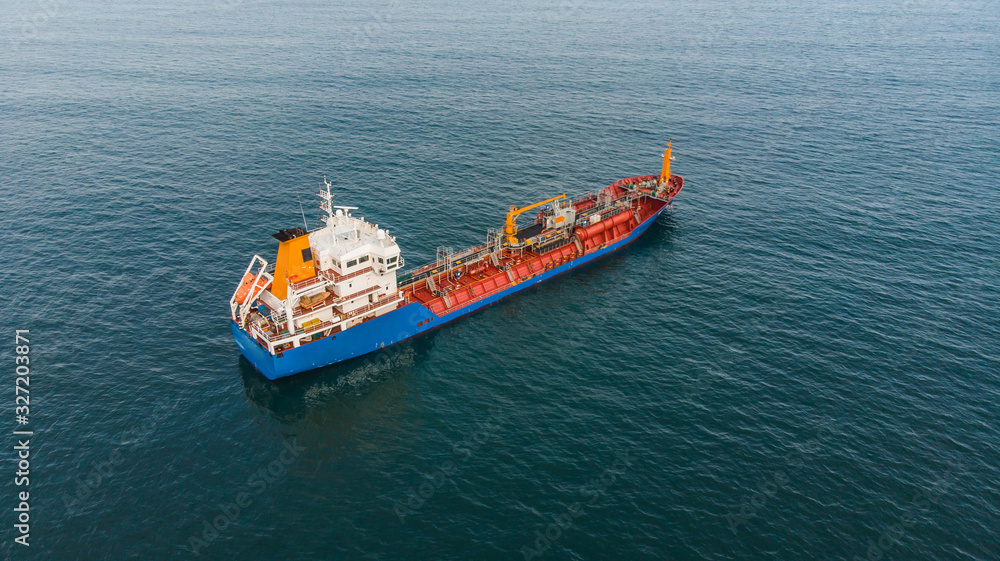 Aerial view of an oil and chemical tanker waiting at sea