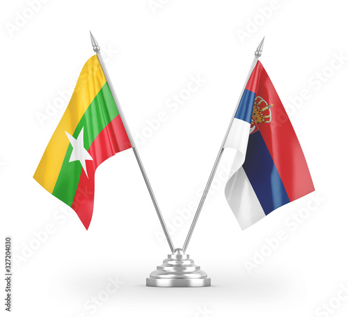 Serbia and Myanmar table flags isolated on white 3D rendering