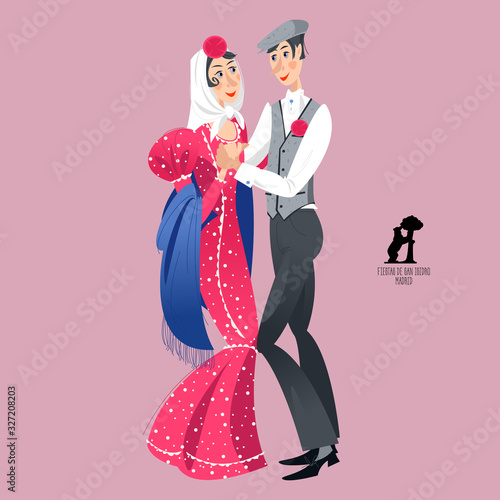 Dancing couple in traditional clothes during the festival of “San Isidro” (Fiestas de San Isidro), patron of Madrid.