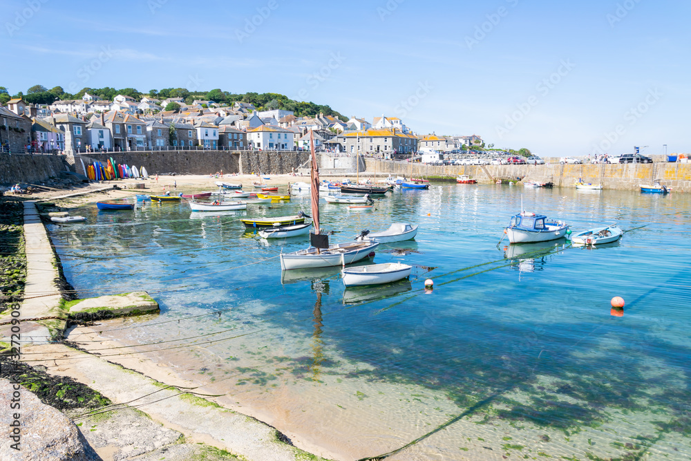 Mousehole Harbour, a picturesque Cornish fishing village near Penzance in Cornwall, England