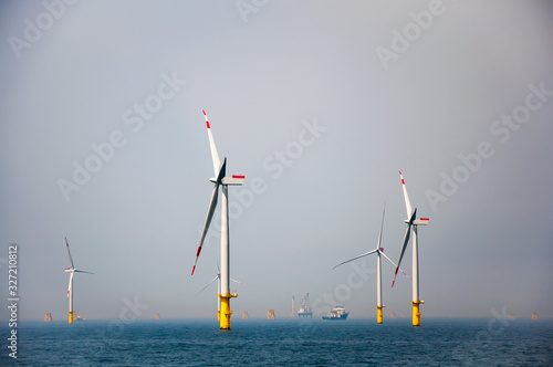 Ofsore wind park in north sea under construcion.