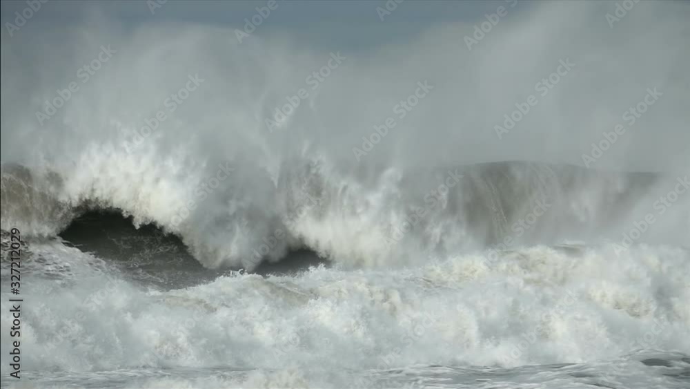 Ocean Sea Spray Wave storm tempest great big waves, blue sky. slow motion Ocean Sea Spray Wave storm tempest great big waves, blue sky. slow motion