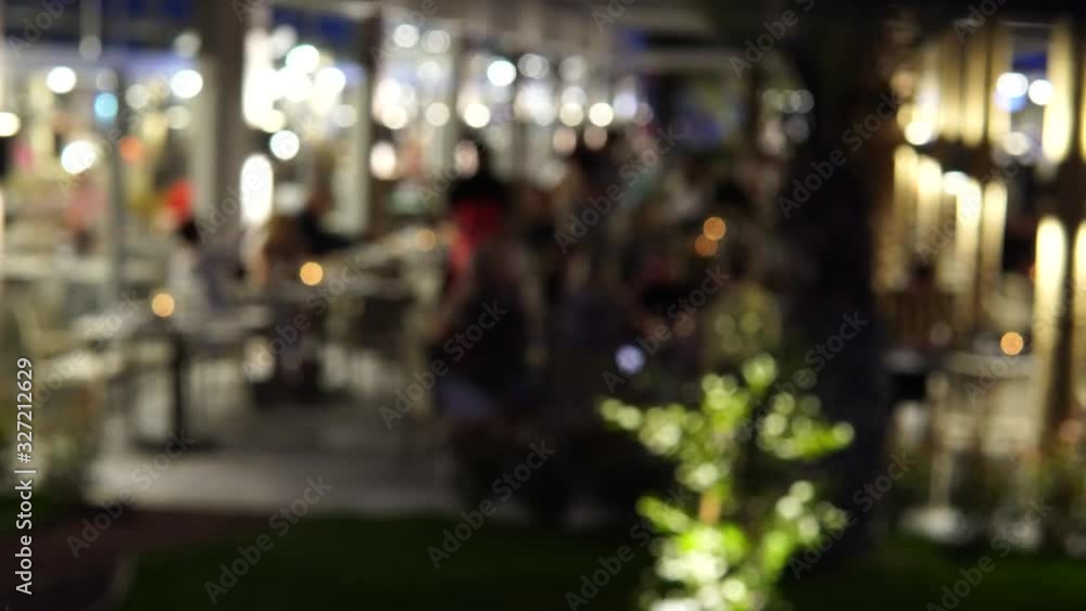 Out of focus image of outdoor restaurant at night. Out of focus image of outdoor restaurant at night.