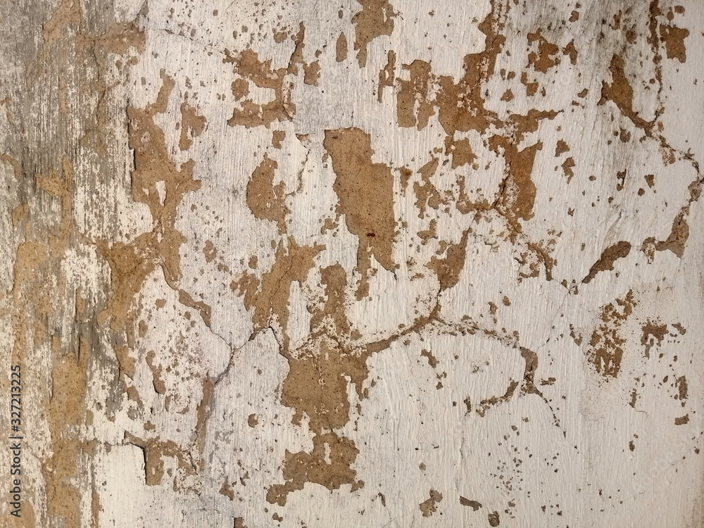 texture of wall paint that has peeling and cracking. Abtract background of  peeling surface.