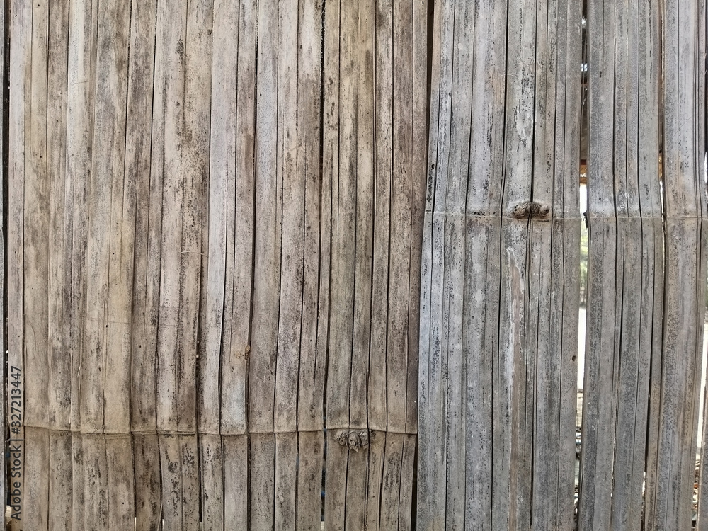 Naklejka premium texture of old bamboo wall background.