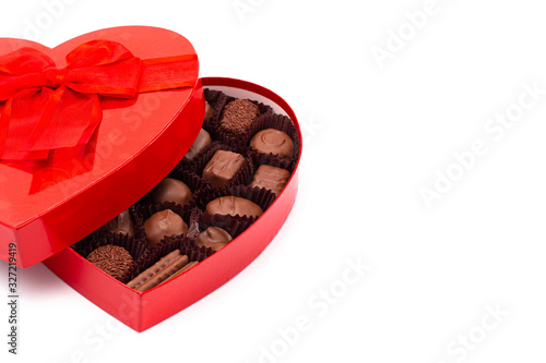 A Red Love Heart Box of Valentines Chocolates Isolated on a White Background