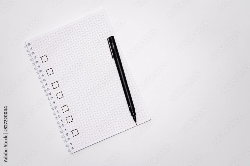 Plakat Check list. Square items are empty and checked with a tick. Squared notebook with black pen on a white background. Record ideas, notes, plans, tasks. Copy Space