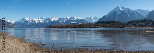 Panorama view to the alps with Eiger, Mönch and Jungfrau on the Lake Thun