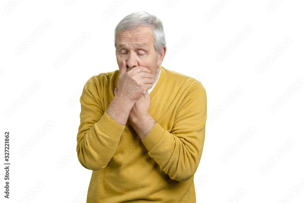 Senior caucasian man coughing. Yellow wool sweater. White isolated background. Senior caucasian man coughing. Yellow wool sweater. White isolated background.