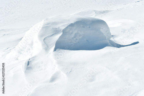 Snow hills and ice in winter