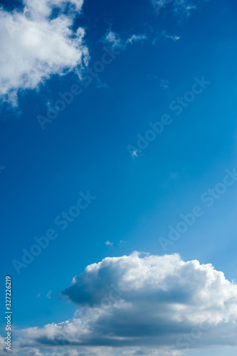 beautiful white clouds in bright blue sky on the nice day