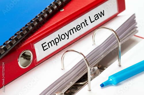 Wallpaper Mural large red folder for Employment Law documents including blue ring binder and blue maker Torontodigital.ca