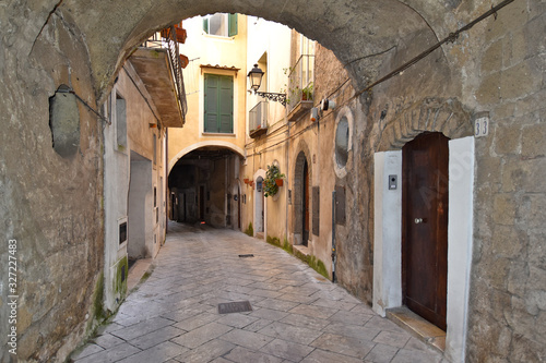 Sant'Agata de 'Goti, Italy, 02/29/2020. A narrow street between old houses of a medieval village. © Giambattista