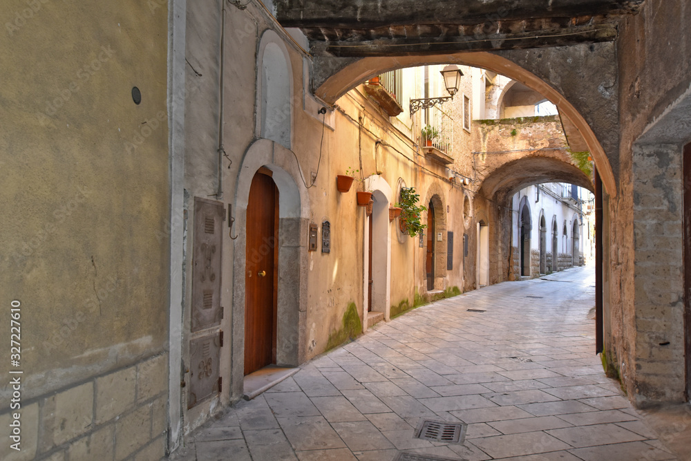 Sant'Agata de 'Goti, Italy, 02/29/2020. A narrow street between old houses of a medieval village.